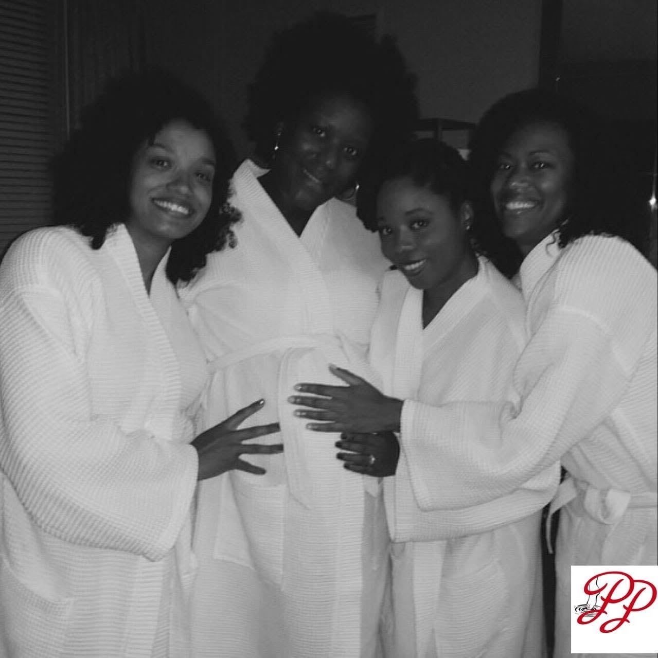 Group of women in spa robes at a Pamper Perfect event
